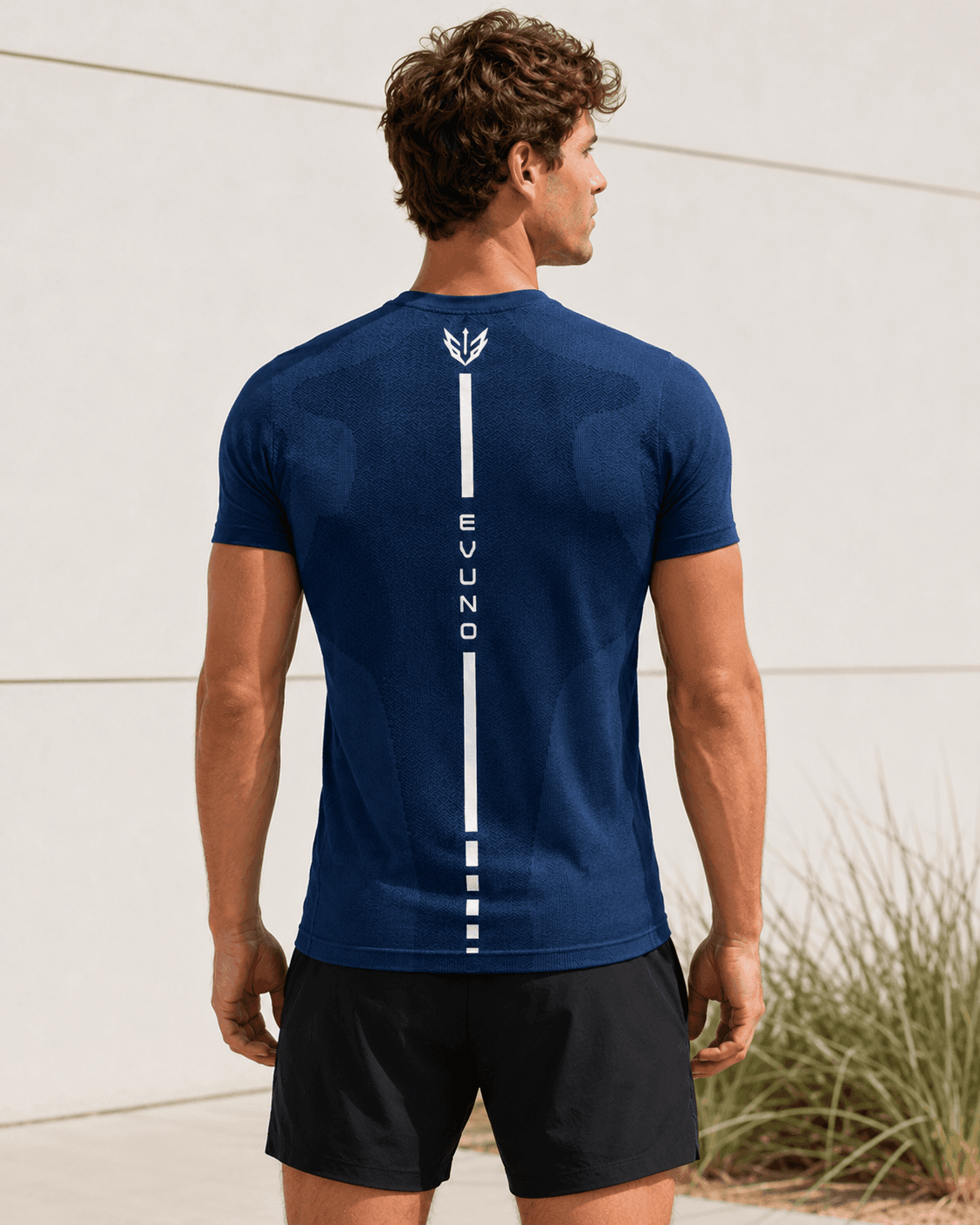 EVUNO APEX 01 Cobalt tee back view on model